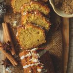 aerial shot of sliced pumpkin cake on a wooden board