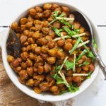 aerial shot of kala chana masala in a white ceramic bowl