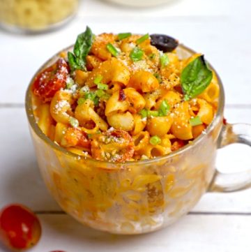 side shot of microwave pasta in a glass mug