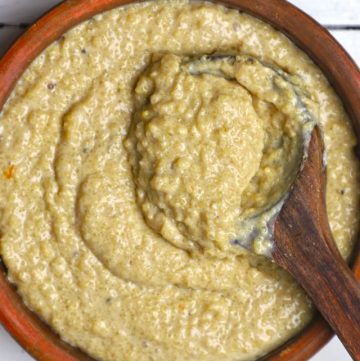 aerial shot of badam phirni in an earthen bowl