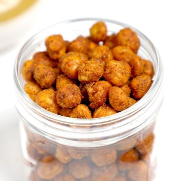 side shot of air fryer crispy chickpeas in a glass jar