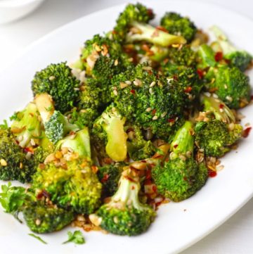 side shot of stir fried broccoli on a platter