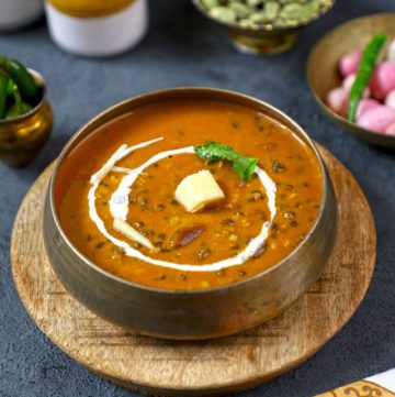 side top shot of dal makhani in a traditional Indian bowl