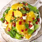 aerial shot of orange salad in a white platter