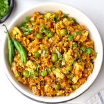 aerial shot of veg keema curry in a white bowl