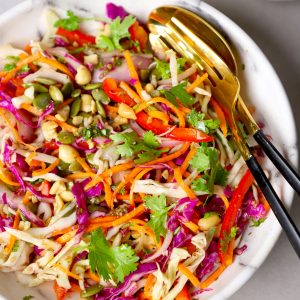 aerial close up shot of cabbage salad in a white bowl