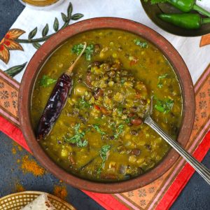 aerial shot of langar wali maa ki dal in an earthen pot