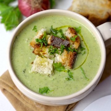 aerial shot of zucchini soup in a mug