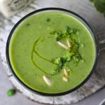 aerial shot of immunity boosting green soup in a mug