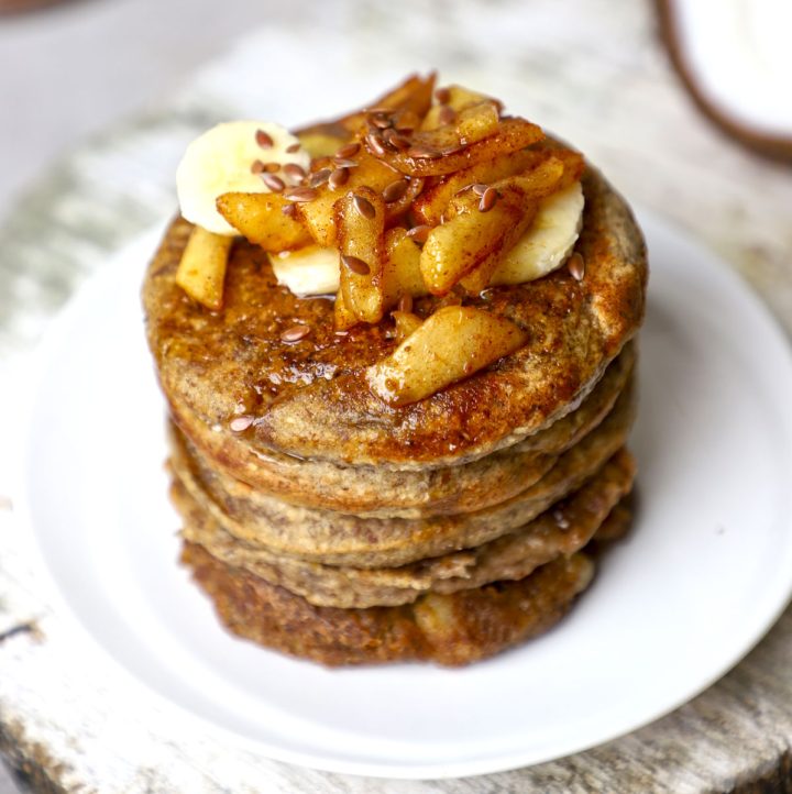 side close up shot of stacked vegan apple pancakes