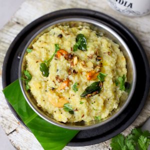 aerial shot of millet pongal in a steel bowl