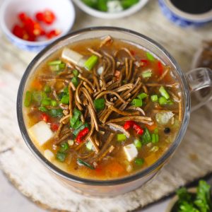 aerial shot of healthy manchow soup in a mug